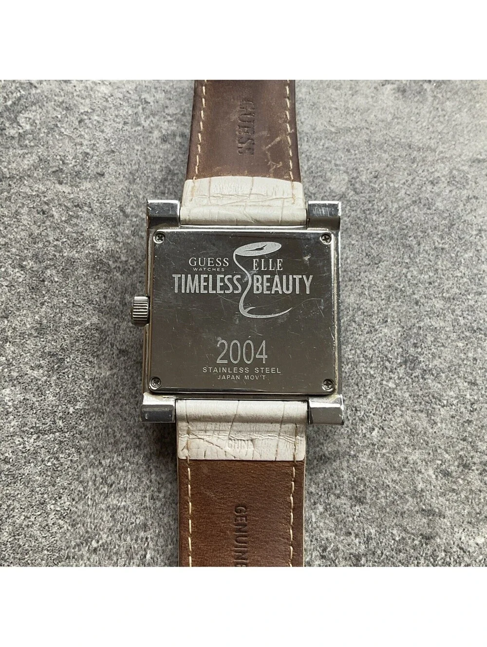 Guess Timeless Elle Beauty 2004 Watch 38mm Silver Tone Case White Leather Band Q